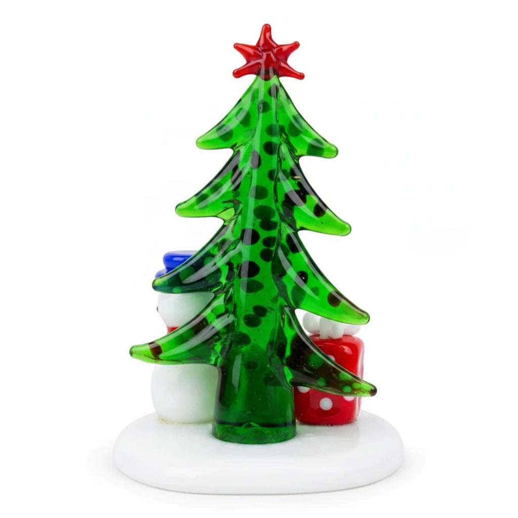 Mellow Monkey Milano Art Glass Christmas tree figurine with a red star, snowman, and gift on a white base.