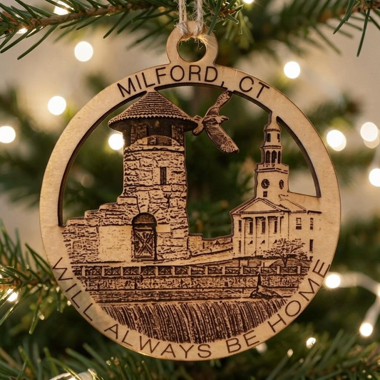 Mellow Monkey wooden ornament featuring Milford CT landmarks, a seagull, and the text Will Always Be Home on a tree.