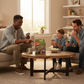 Mellow Monkey Minecraft UNO card game box on a wooden coffee table with a family playing together in a living room.