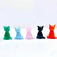 Mellow Monkey set of five colorful handblown glass mini cat figurines in green, blue, pink, black, and orange.