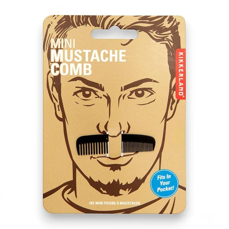 Mellow Monkey mini stainless steel mustache comb on illustrated cardboard packaging