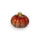 Mellow Monkey set of five hand-painted resin mini pumpkins in assorted seasonal colors with glossy gold stems.