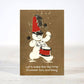 Mellow Monkey mini Christmas card featuring a vintage-style snowman drummer with red hat and drum on brown paper