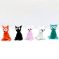 Mellow Monkey set of five miniature handblown glass cats in orange, black, pink, white, and greenish-teal colors.