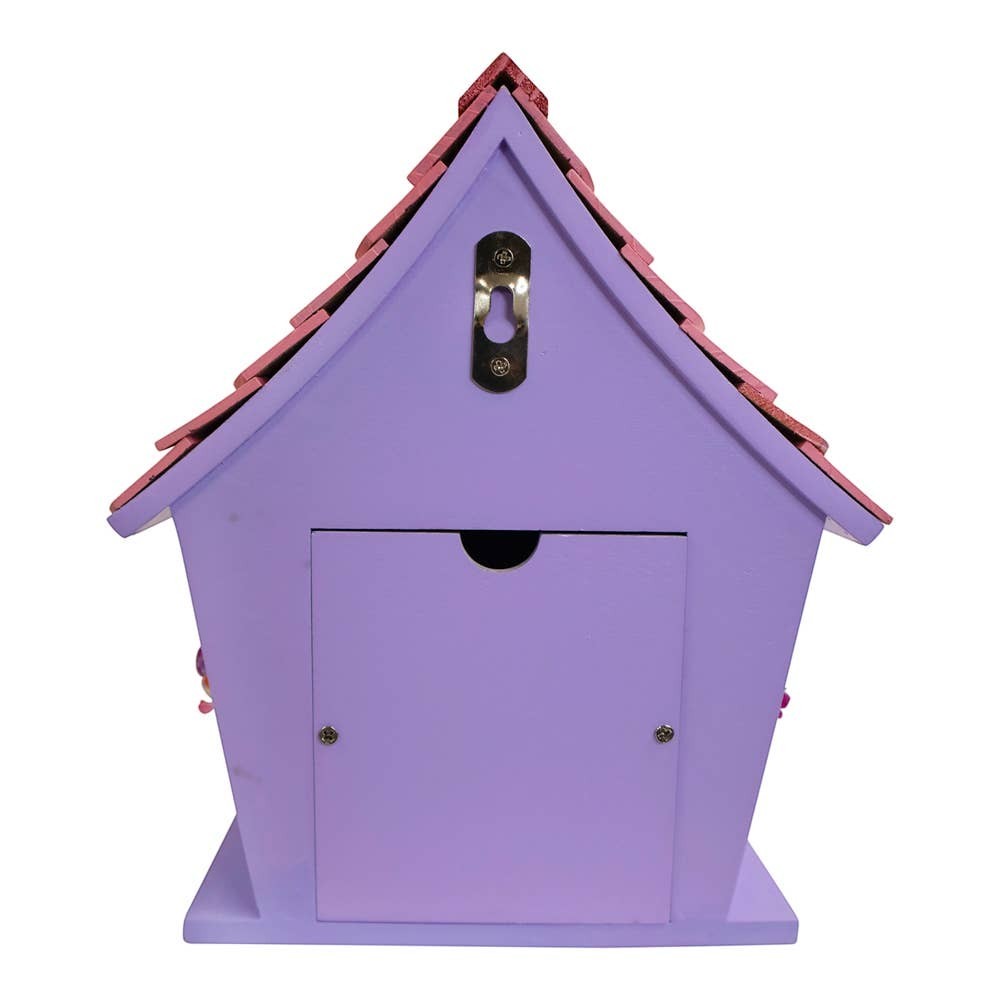 Mellow Monkey Minnie Icon Pink Birdhouse, a lavender wooden birdhouse with a pink roof and a Minnie Mouse character on the front.