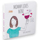 Mellow Monkey Mommy Loves Wine hardcover book by Mike Lukaszewicz. Features a whimsical illustration of a smiling mom holding a glass of red wine, with hearts and a framed picture.