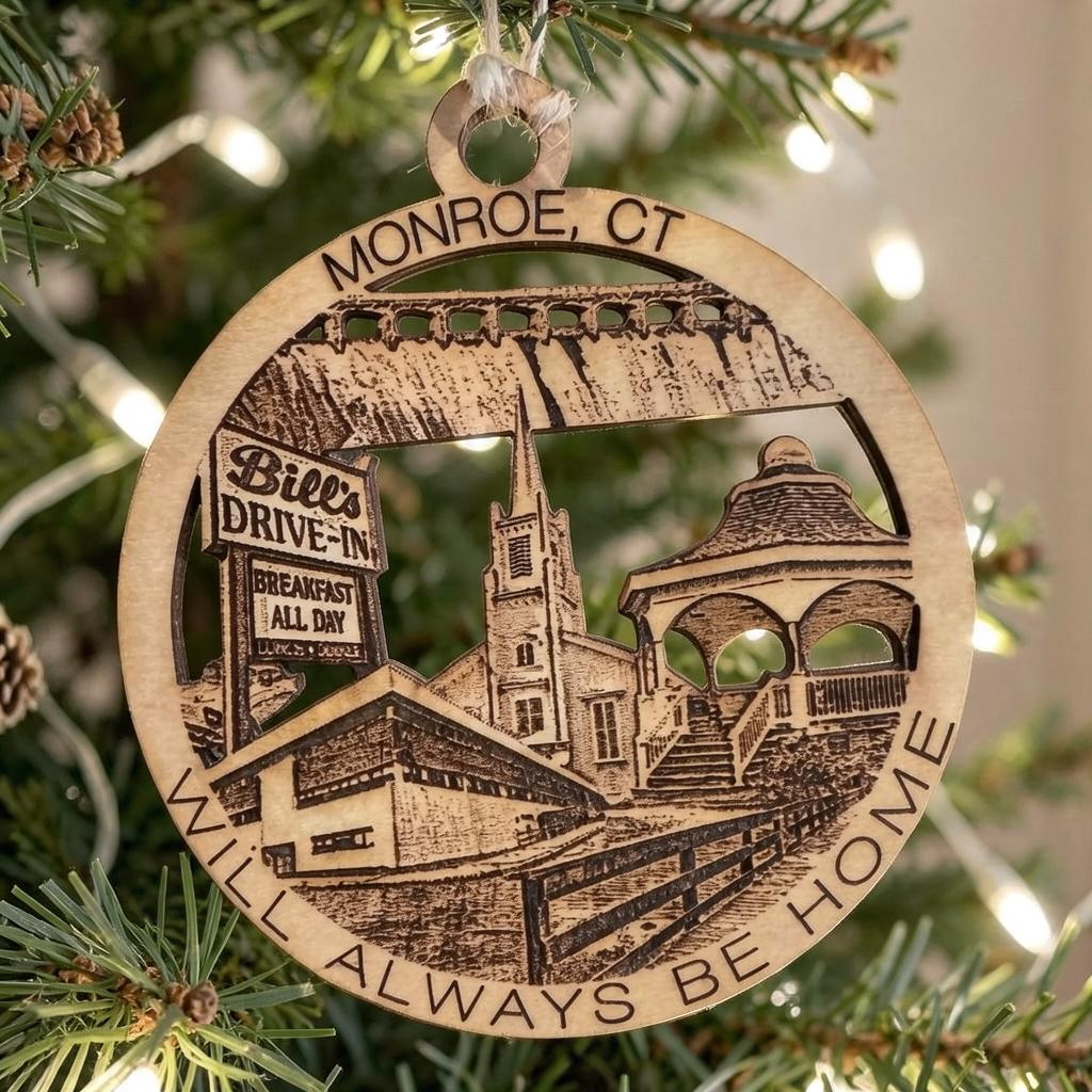 Mellow Monkey round wooden ornament featuring laser-cut Monroe, CT landmarks like Bill's Drive-In and the town gazebo.