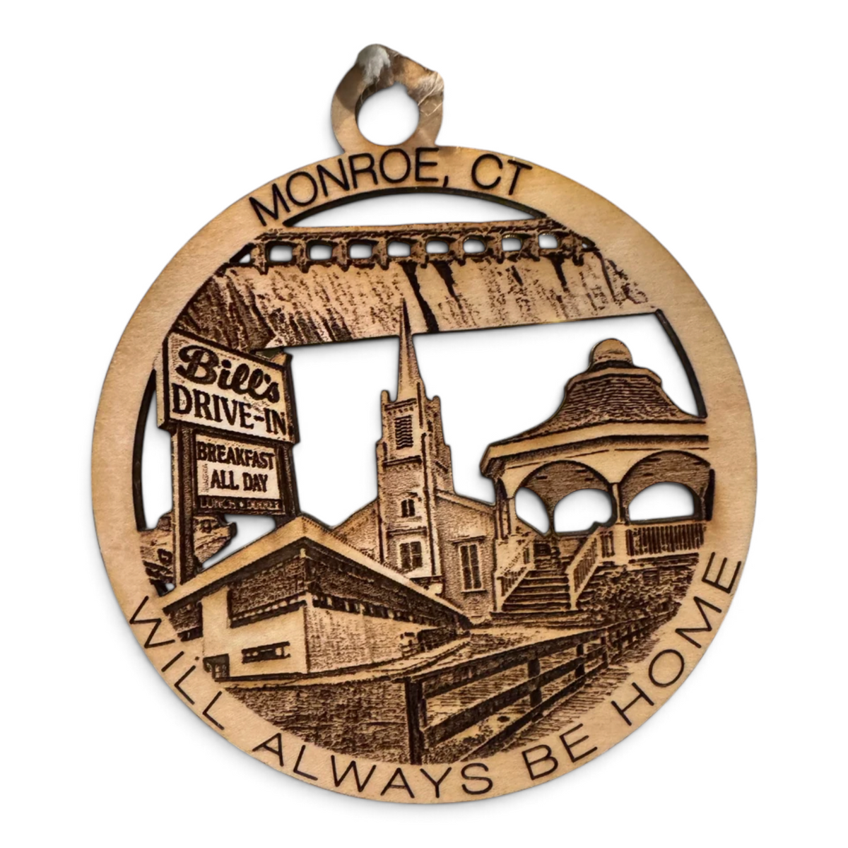 Mellow Monkey round wooden ornament featuring laser-cut Monroe CT landmarks and the text Will Always Be Home