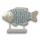 Mellow Monkey 25-inch mosaic capiz shell and metal fish sculpture on a whitewashed wooden base for coastal decor.