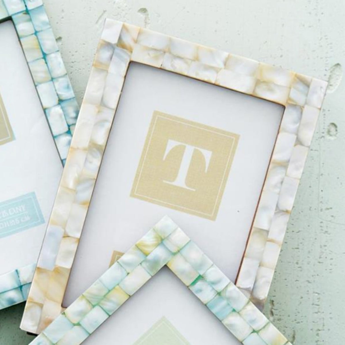 Mellow Monkey mother of pearl tile photo frames in seafoam and sand hues with sheesham wood and glass construction