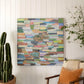 Mellow Monkey gallery wrap wall art featuring colorful motivational quotes on a white wall above a cozy armchair.