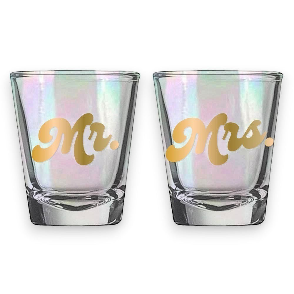 Mellow Monkey Mr. & Mrs. iridescent shot glasses with gold script lettering. Set of 2, 2oz each.