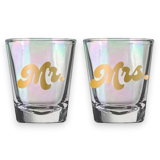 Mellow Monkey Mr. & Mrs. iridescent shot glasses with gold script lettering. Set of 2, 2oz each.