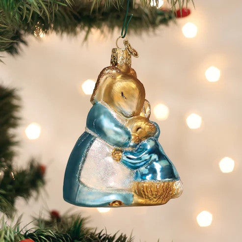 Mellow Monkey Mrs. Rabbit And Peter blown glass holiday ornament, 3-3/4-in. Features mother rabbit hugging Peter.