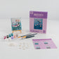 Mellow Monkey Muddies 3D textured tulip painting kit with mini canvas, easel, paints, sand, and resin shapes.