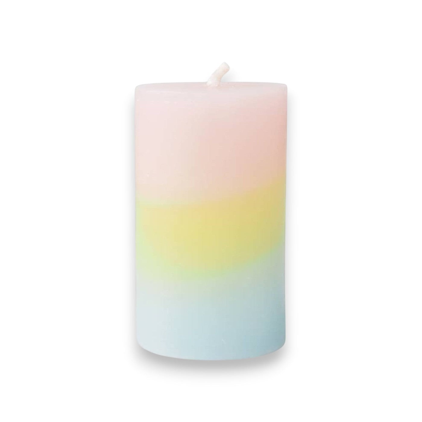 Mellow Monkey multi-scented pillar candle featuring a pink, yellow, and blue ombre wax design with a cotton wick.