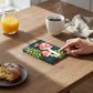 Mellow Monkey Nurture Together Tile Acrylic Wall Art, 5x7-in, featuring red mushrooms with white spots and a yellow butterfly on a dark teal background with green leaves.