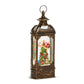 Mellow Monkey gold musical water lantern featuring Santa flying around a Christmas tree with swirling glitter.