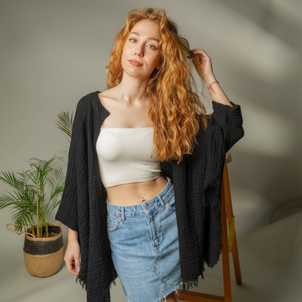 Mellow Monkey light green 4-layer muslin kimono robe with frayed hem and open front, worn by a model with curly red hair.