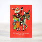 Mellow Monkey mini Christmas card featuring a vintage illustration of Santa riding a donkey on a bright red background.