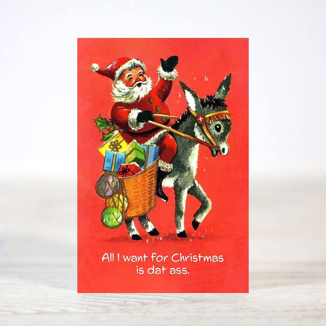 Mellow Monkey mini Christmas card featuring a vintage illustration of Santa riding a donkey on a bright red background.