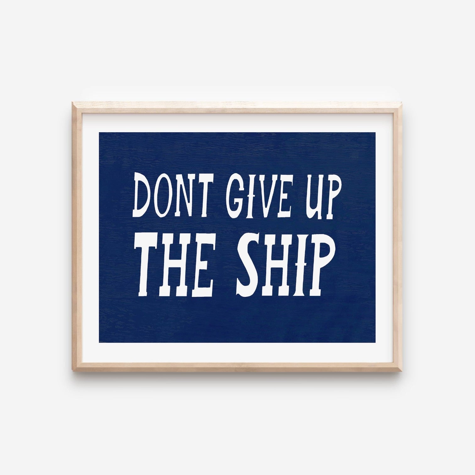 Mellow Monkey Don't Give Up the Ship framed nautical art print with white text on a navy blue background.