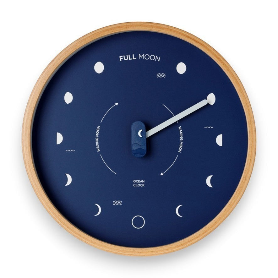 Mellow Monkey navy blue wood marine lunar phase clock with a natural beech frame and white hand, 10-in diameter.