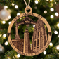 Mellow Monkey wooden ornament featuring New Haven landmarks like Harkness Tower and a lighthouse with pizza accents.