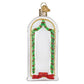 Mellow Monkey New Home Old World Christmas blown glass ornament with gold trim, green garland, and red bow.