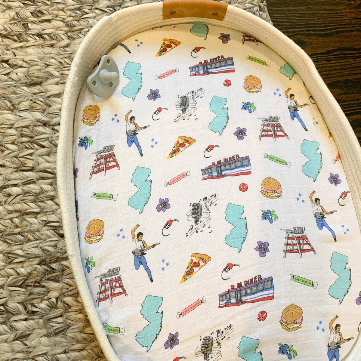 Mellow Monkey New Jersey themed muslin swaddle blanket with diner, beach, and music icons on bamboo cotton blend