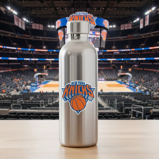 Mellow Monkey New York Knicks vinyl decal applied to a silver metal water bottle in a basketball arena setting.