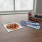 Mellow Monkey New York Knicks basketball logo vinyl decal on a wooden desk with NBA Finals tickets and a team mug.