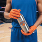 Mellow Monkey New York Knicks vinyl decal applied to a silver water bottle held by a person in team uniform.