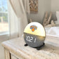 Mellow Monkey New York Knicks sunrise alarm clock with digital display on a wooden bedside table