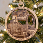 Mellow Monkey 4-inch round wooden Norwalk, CT ornament featuring laser-engraved landmarks and burlap hanging string.