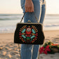 Mellow Monkey Nutcracker kisslock bag with embroidered holiday design held by a person on a beach at sunset.