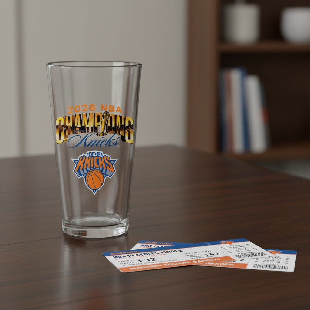 Mellow Monkey 16-oz NY Knicks 2026 NBA Champions pint glass with team logo and championship graphics on a table.