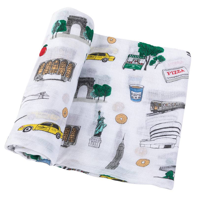 Mellow Monkey New York City themed muslin swaddle blanket in soft bamboo and organic cotton with colorful NYC icons.