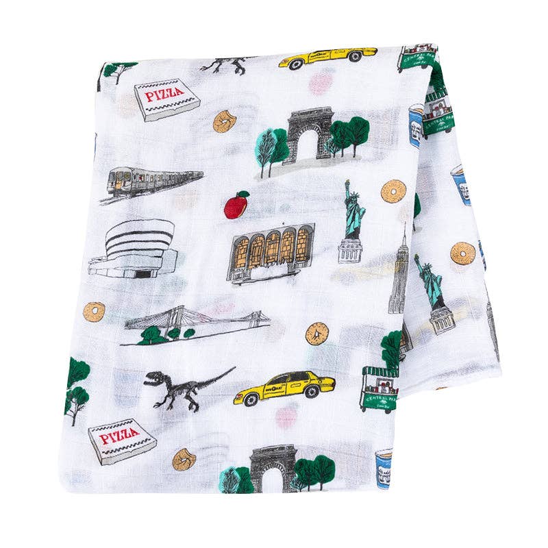 Mellow Monkey NYC themed muslin swaddle blanket featuring iconic New York City landmarks in soft bamboo cotton