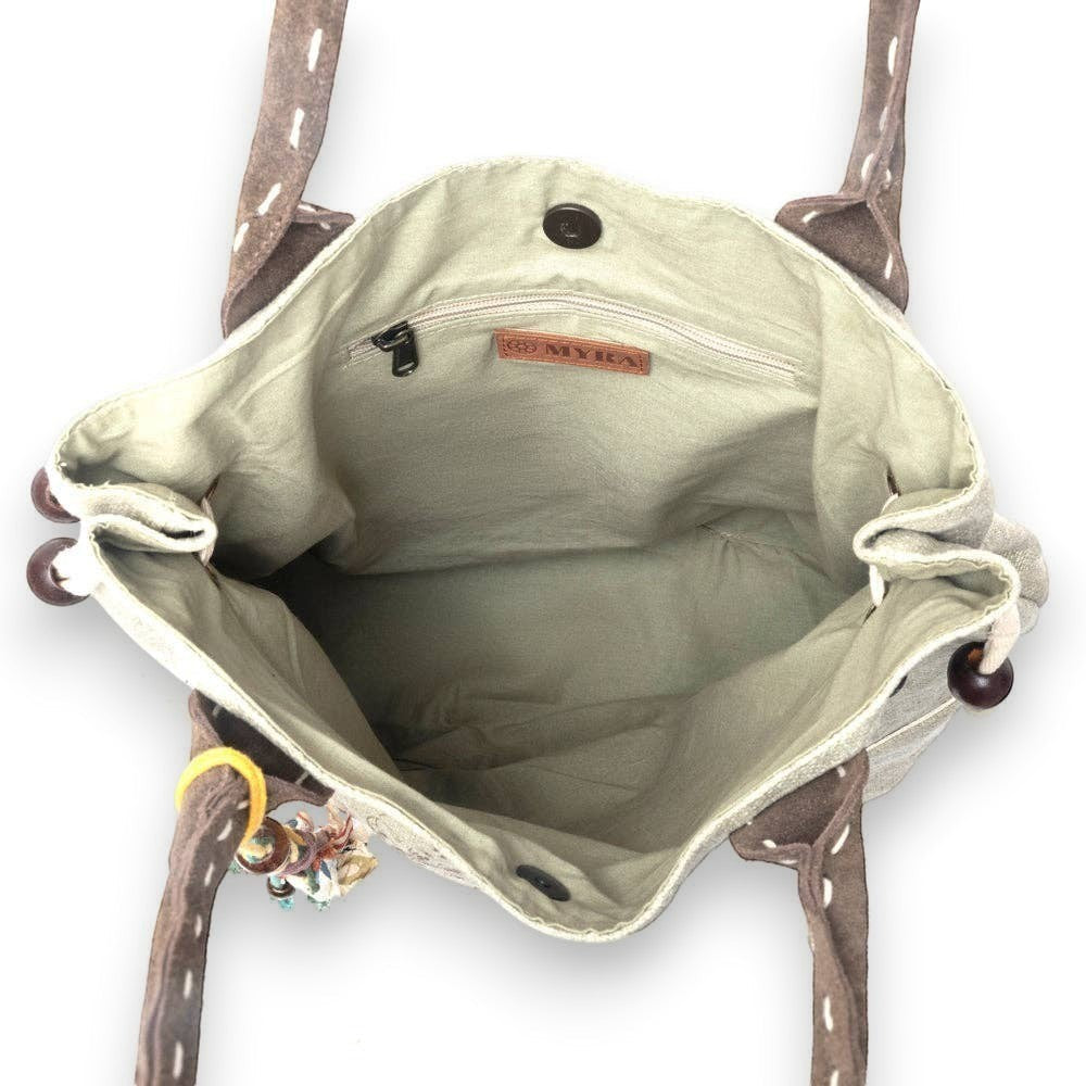 Mellow Monkey Old Soul tote bag interior view showing cotton lining, zip pocket, and magnetic snap closure.
