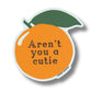 Mellow Monkey orange-shaped waterproof vinyl sticker with a green leaf and the text Aren't you a cutie