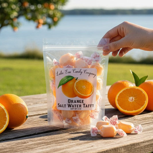 Mellow Monkey orange salt water taffy in a 6-oz bag, featuring a label with oranges and the text "Orange Salt Water Taffy".