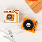 Mellow Monkey retro orange vinyl record player style kitchen timer with its original packaging on a marble counter.