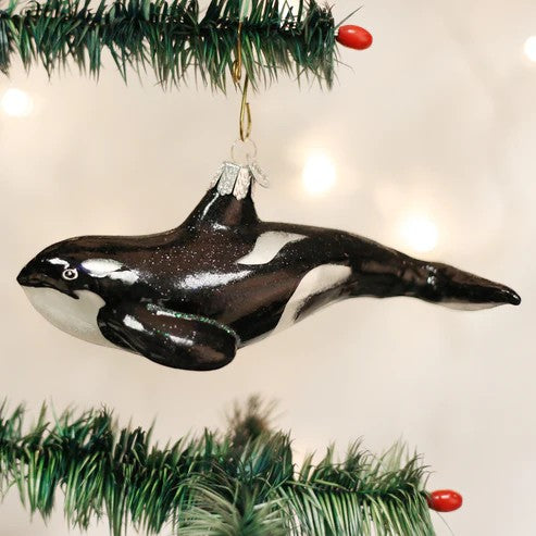 Mellow Monkey Orca Whale blown glass holiday ornament, black and white with glitter accents, 6-1/4 inches.