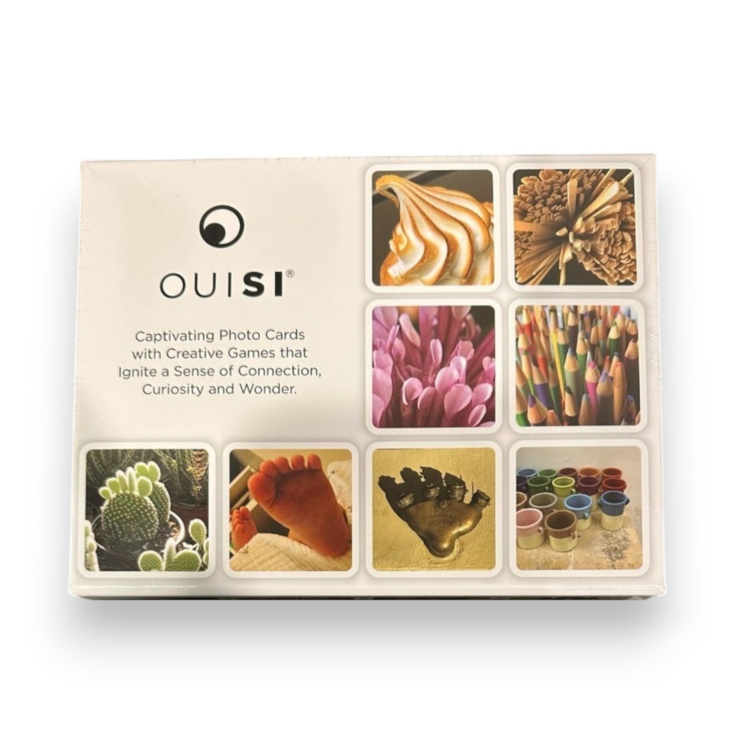 Mellow Monkey OuiSi nature photo card game box featuring a grid of colorful, detailed nature and pattern images.