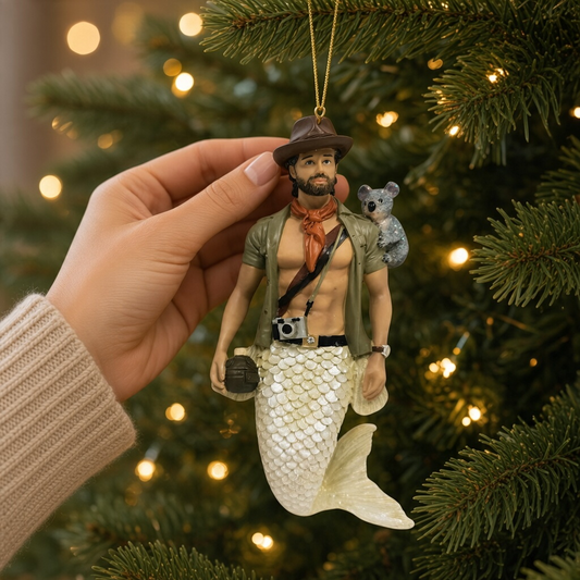 Mellow Monkey December Diamonds Outback merman ornament featuring a koala, hat, and camera on a Christmas tree.