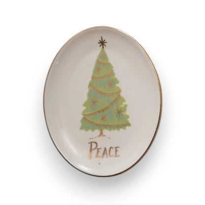 Mellow Monkey set of four oval stoneware dishes featuring festive Christmas tree designs and gold-tone trim