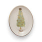 Mellow Monkey set of four oval stoneware dishes featuring festive Christmas tree designs and gold electroplated rims.