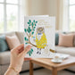 Mellow Monkey birthday card featuring a dapper owl in a yellow floral jacket with gold foil accents and a martini.