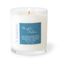 Mellow Monkey Pacific Isles 9-ounce soy blend candle in a clear glass jar with a blue tropical fragrance label.